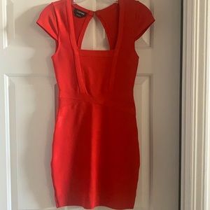 Never worn mini bandage dress in a beautiful burnt orange color! 💃